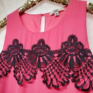 "YA"Los Angeles cantaloupe colored, sleevless dress with black lace. Size medium